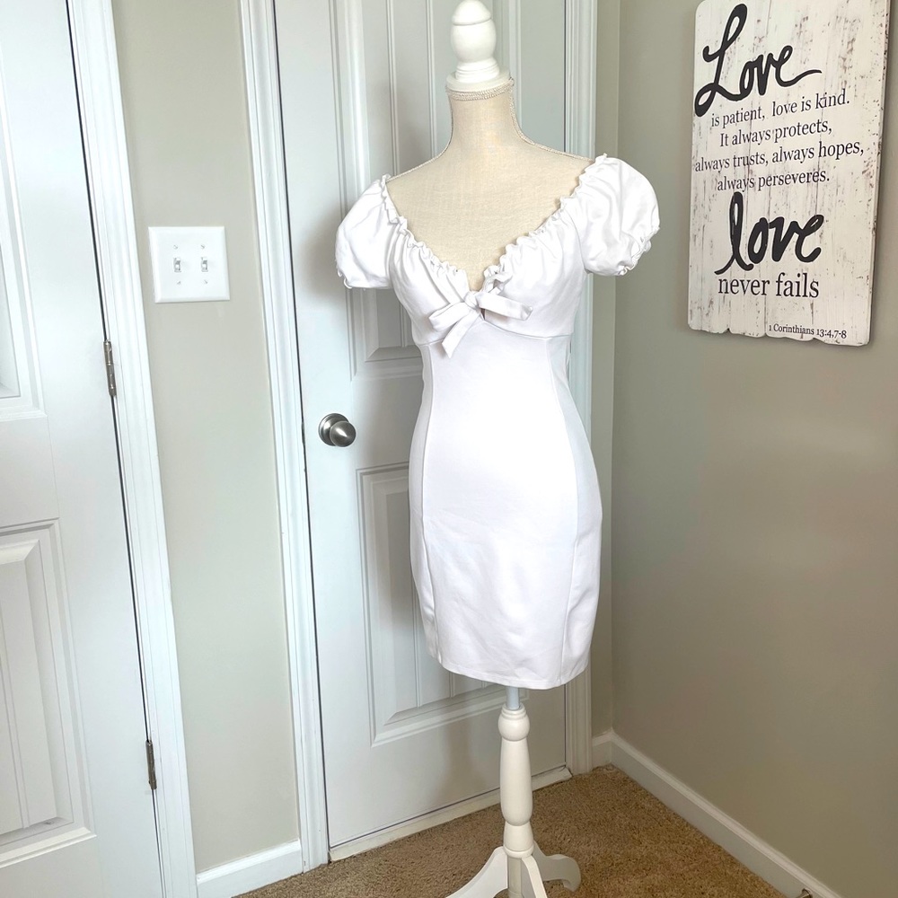 White off the shoulder mini stretch dress.